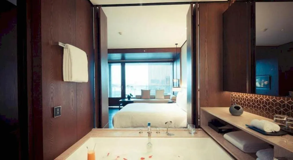 Bed in OCT Bay Breeze Hotel