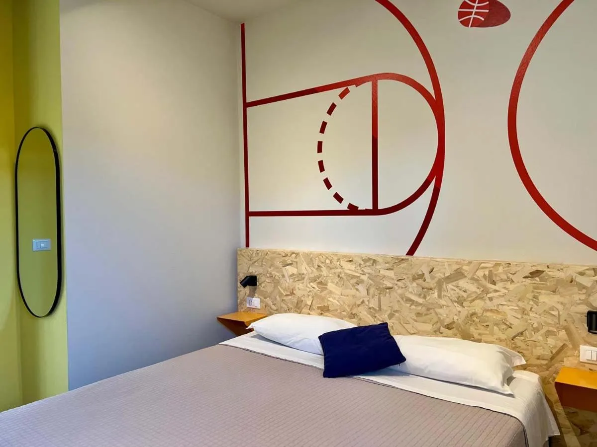 Bed in Fantini Club Hotel