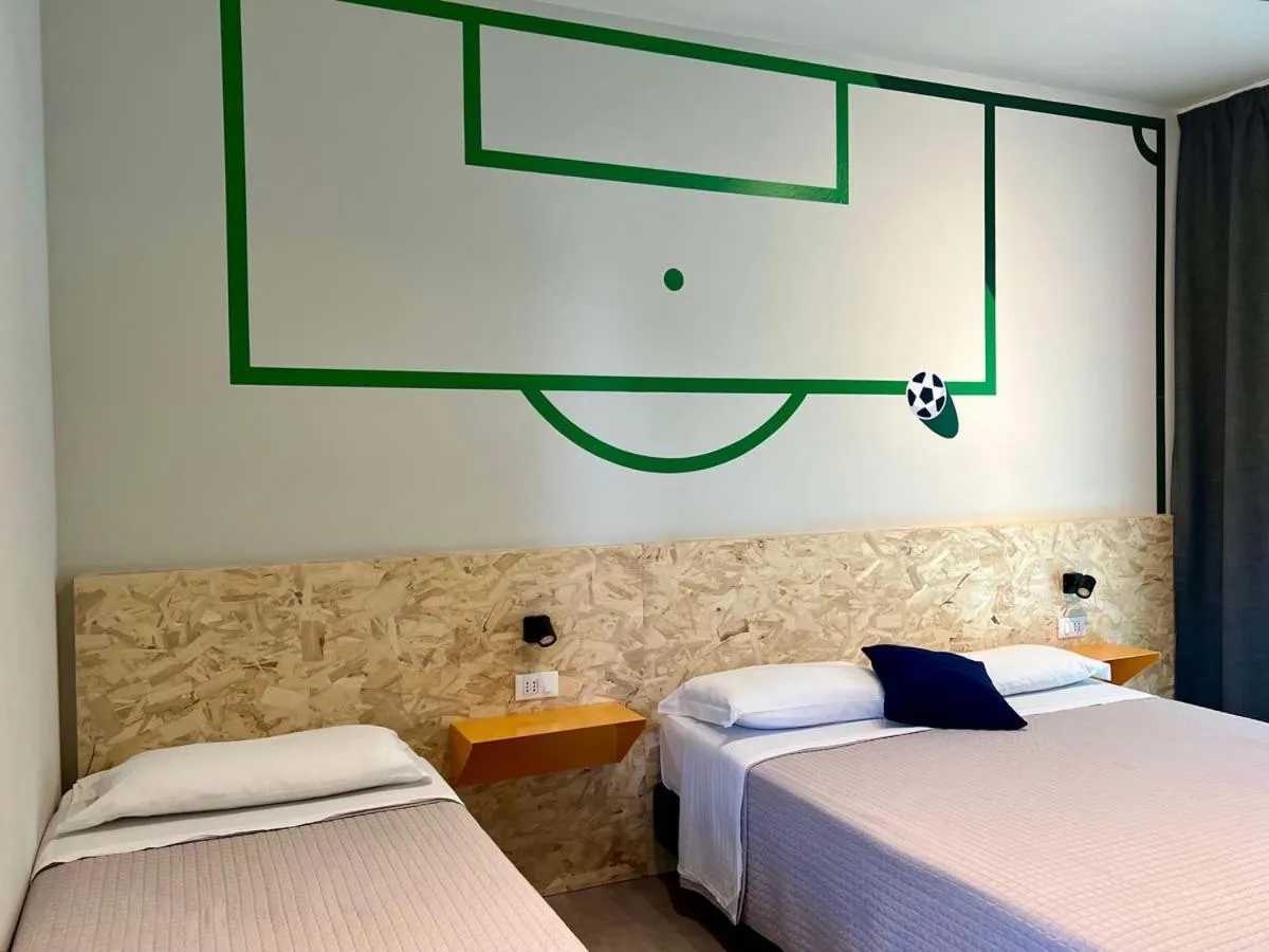 Bed in Fantini Club Hotel