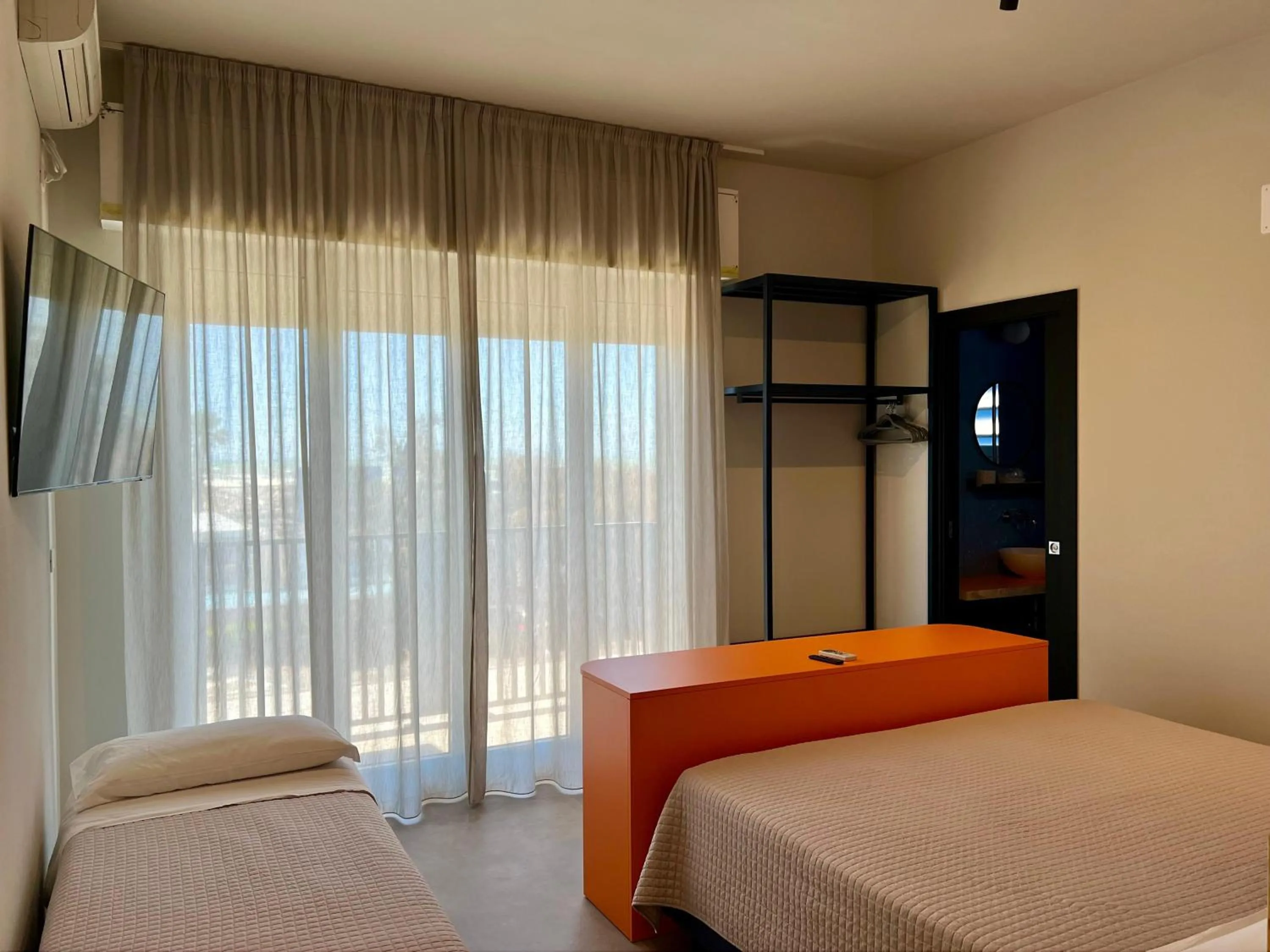 Bed in Fantini Club Hotel