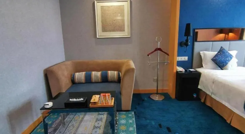 Bed in Grand Skylight Hotel KaiMei