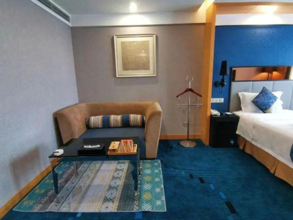 Bed in Grand Skylight Hotel KaiMei