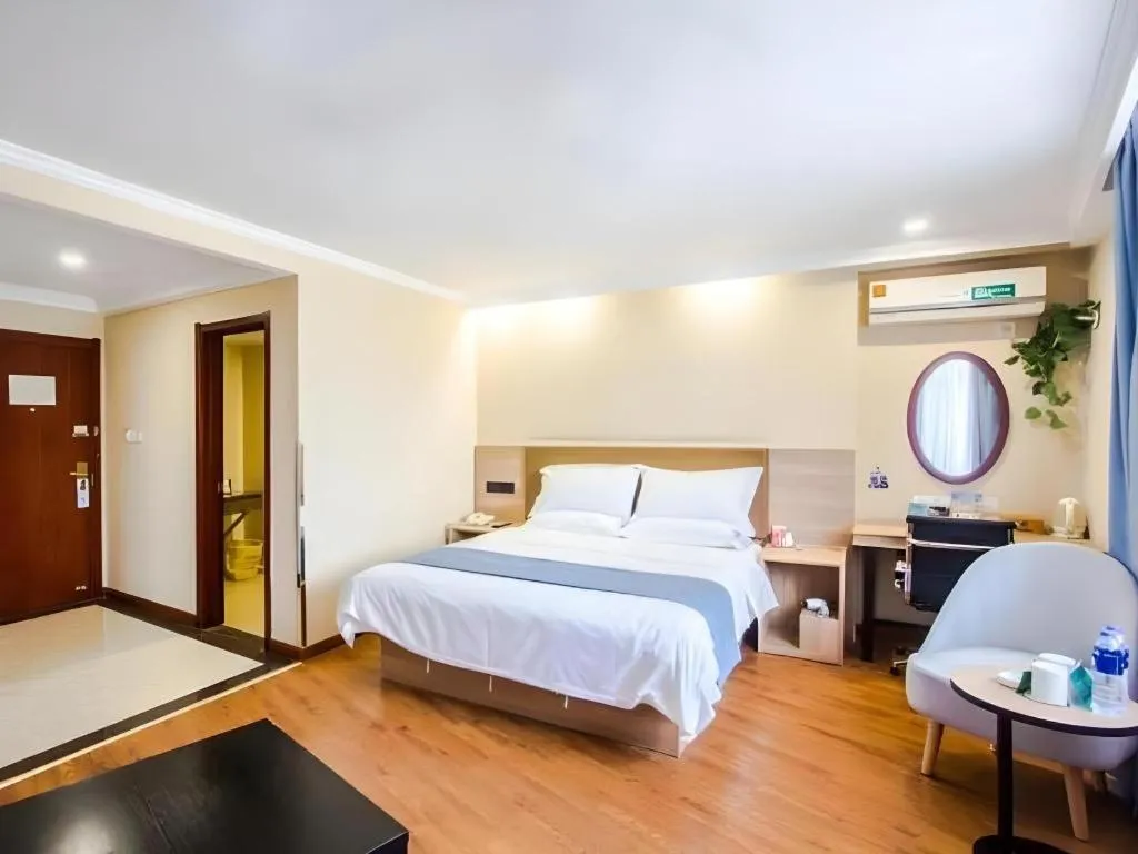 Bed in GreenTree Inn Jiaxing Tongxiang Tudian Express Hotel