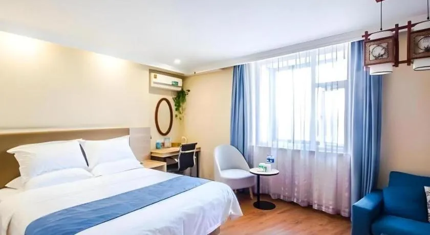 Bed in GreenTree Inn Jiaxing Tongxiang Tudian Express Hotel