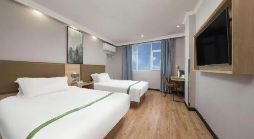 Bed in GreenTree Inn Jiaxing Tongxiang Tudian Express Hotel