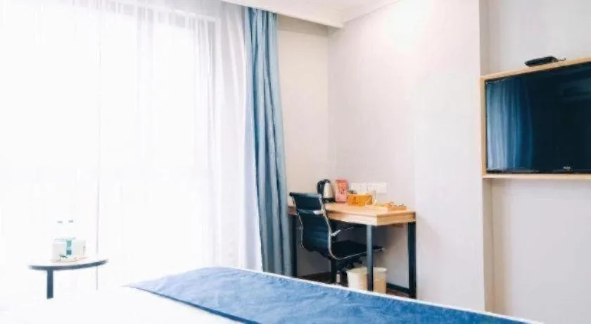 Bed in GreenTree Inn Jiaxing Tongxiang Tudian Express Hotel