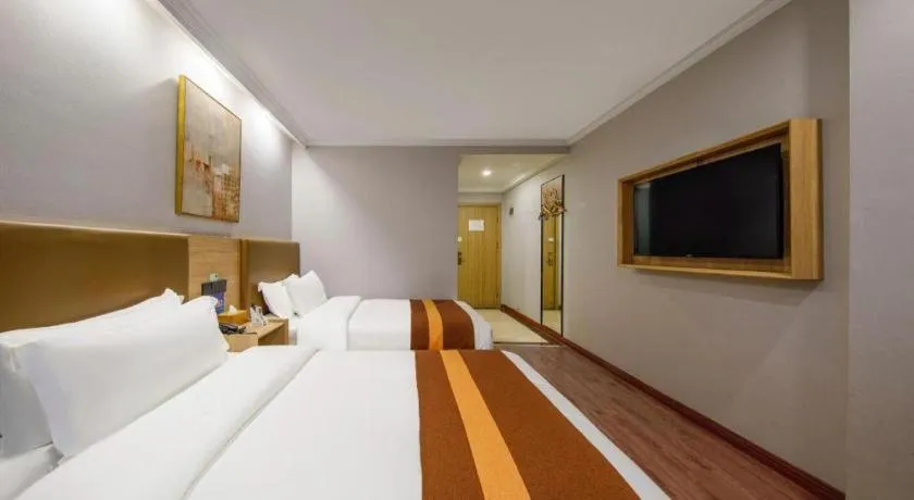 Bed in GreenTree Inn Jiaxing Tongxiang Tudian Express Hotel