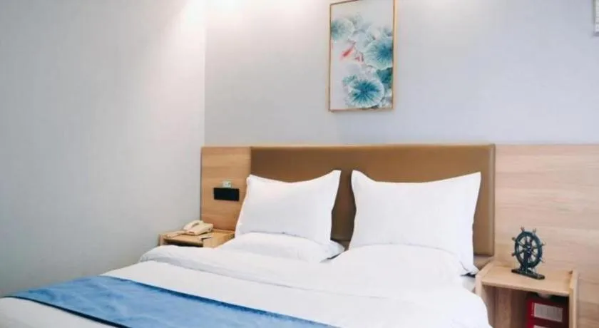 Bed in GreenTree Inn Jiaxing Tongxiang Tudian Express Hotel
