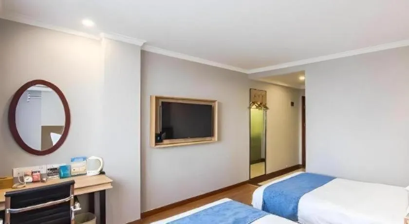 Bed in GreenTree Inn Jiaxing Tongxiang Tudian Express Hotel