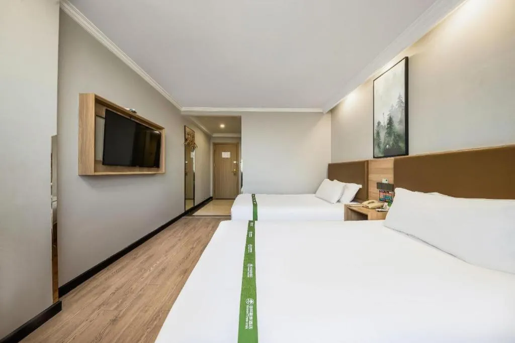 Bed in GreenTree Inn Jiaxing Tongxiang Tudian Express Hotel