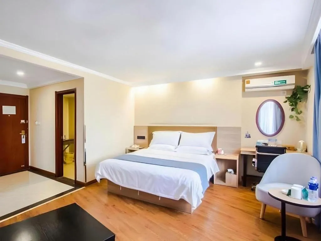 Bed in GreenTree Inn Jiaxing Tongxiang Tudian Express Hotel