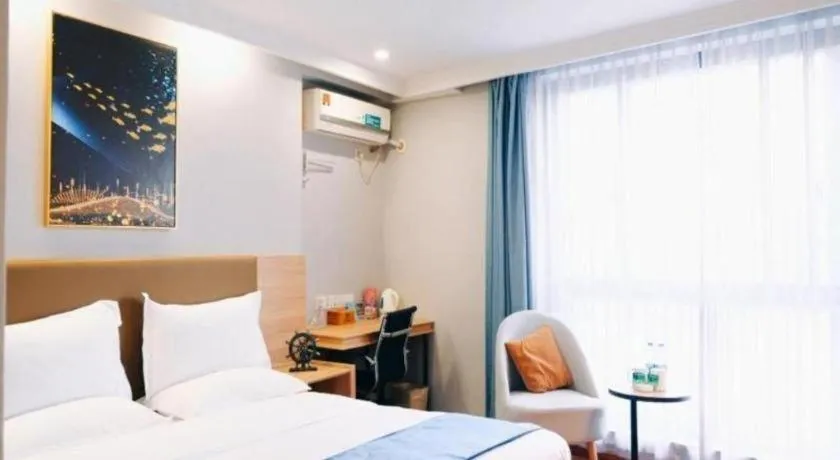 Bed in GreenTree Inn Jiaxing Tongxiang Tudian Express Hotel