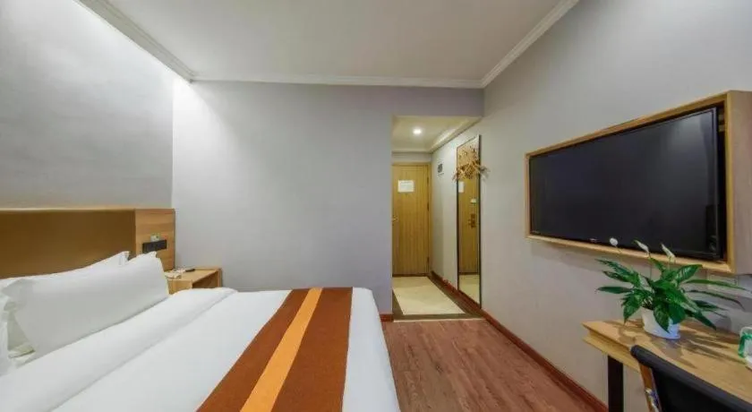 Bed in GreenTree Inn Jiaxing Tongxiang Tudian Express Hotel