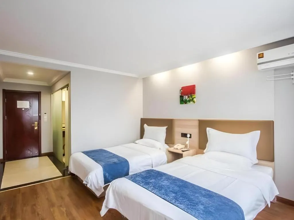 Bed in GreenTree Inn Jiaxing Tongxiang Tudian Express Hotel