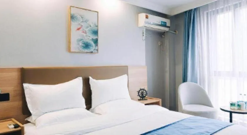 Bed in GreenTree Inn Jiaxing Tongxiang Tudian Express Hotel