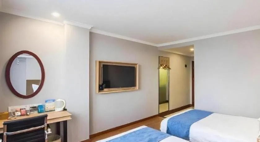 Bed in GreenTree Inn Jiaxing Tongxiang Tudian Express Hotel