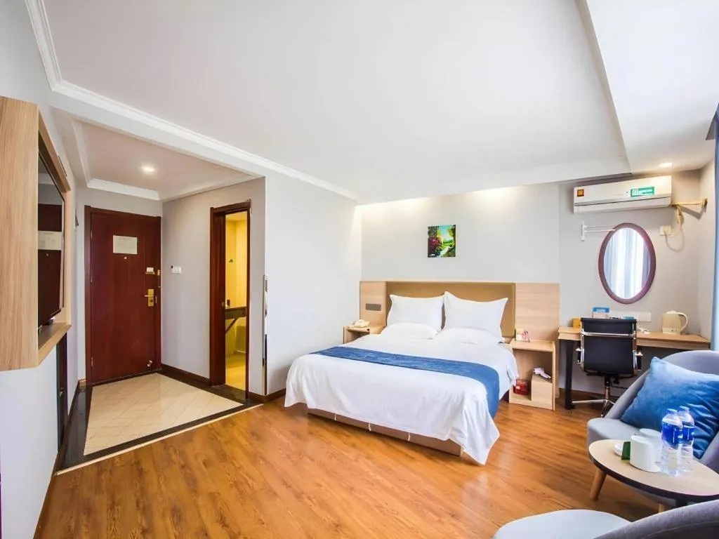 Bed in GreenTree Inn Jiaxing Tongxiang Tudian Express Hotel