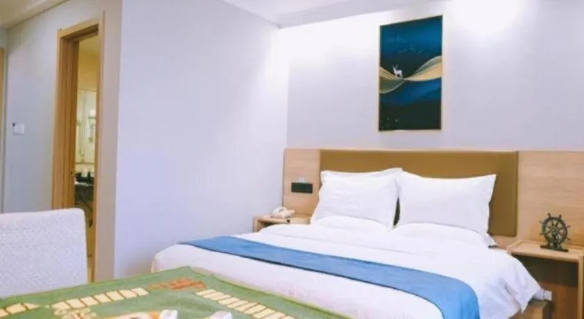 Bed in GreenTree Inn Jiaxing Tongxiang Tudian Express Hotel