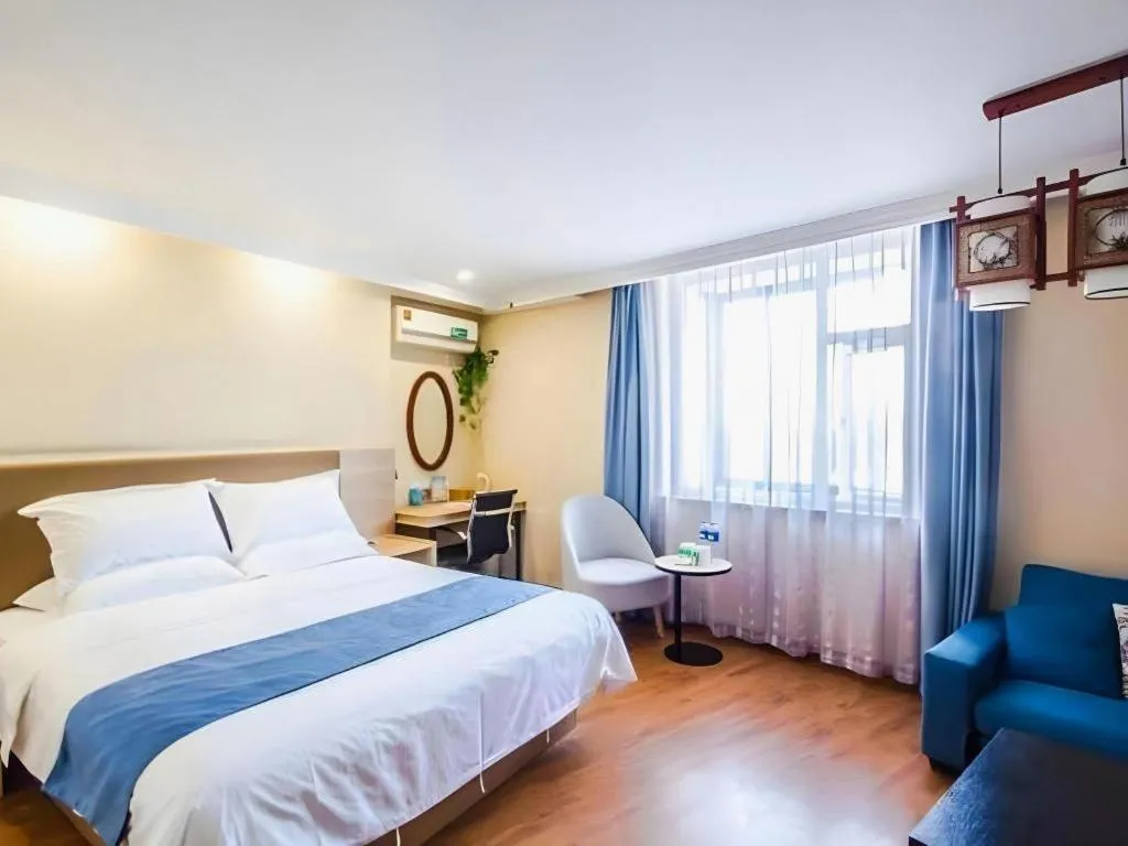 Bed in GreenTree Inn Jiaxing Tongxiang Tudian Express Hotel