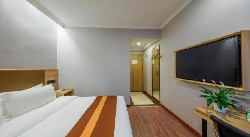 Bed in GreenTree Inn Jiaxing Tongxiang Tudian Express Hotel