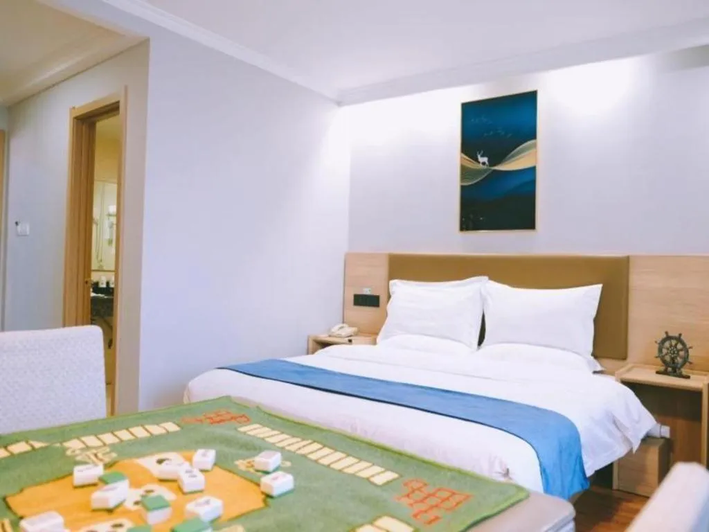 Bed in GreenTree Inn Jiaxing Tongxiang Tudian Express Hotel