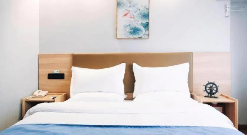 Bed in GreenTree Inn Jiaxing Tongxiang Tudian Express Hotel