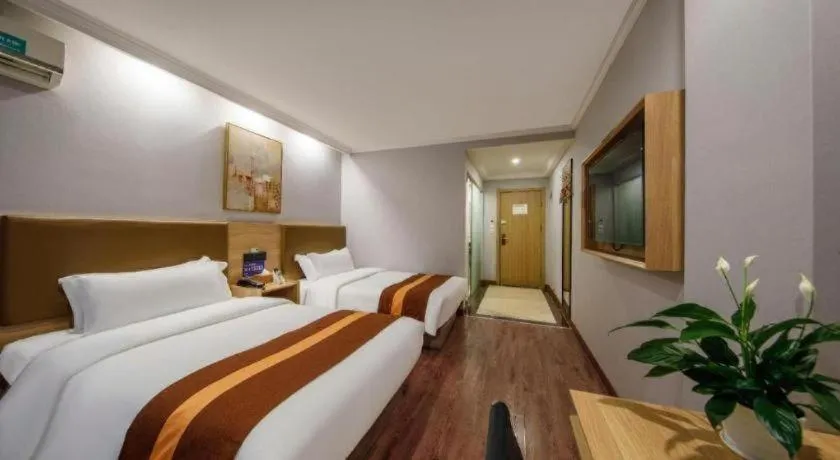 Bed in GreenTree Inn Jiaxing Tongxiang Tudian Express Hotel