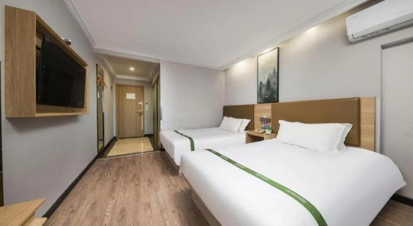 Bed in GreenTree Inn Jiaxing Tongxiang Tudian Express Hotel