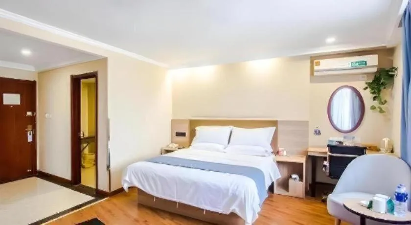 Bed in GreenTree Inn Jiaxing Tongxiang Tudian Express Hotel