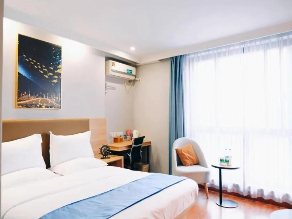 Bed in GreenTree Inn Jiaxing Tongxiang Tudian Express Hotel