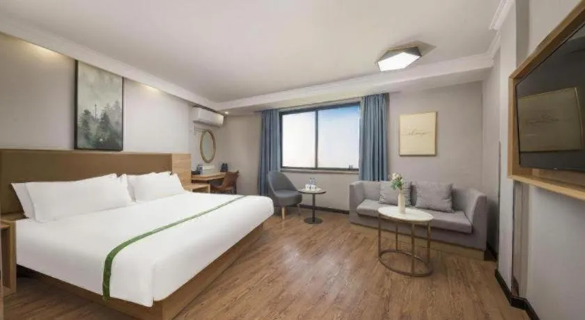 Bed in GreenTree Inn Jiaxing Tongxiang Tudian Express Hotel