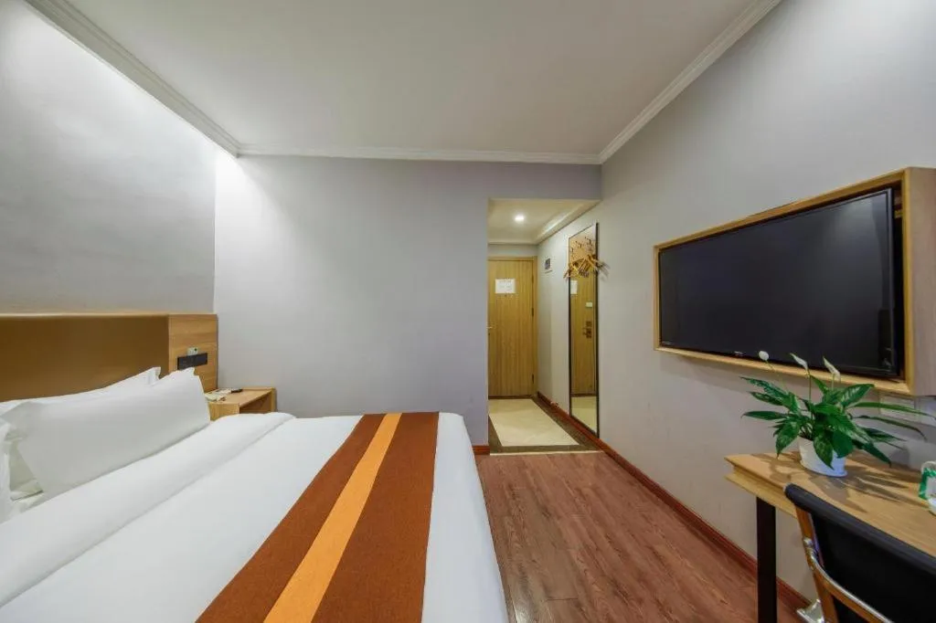 Bed in GreenTree Inn Jiaxing Tongxiang Tudian Express Hotel