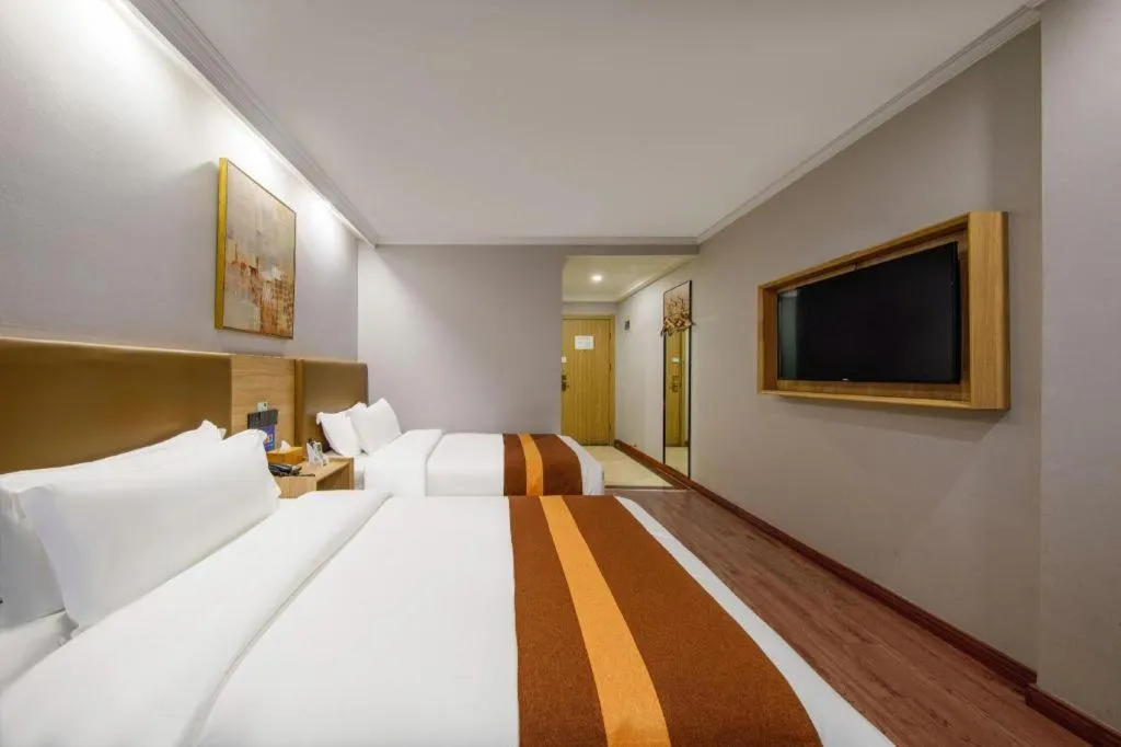 Bed in GreenTree Inn Jiaxing Tongxiang Tudian Express Hotel