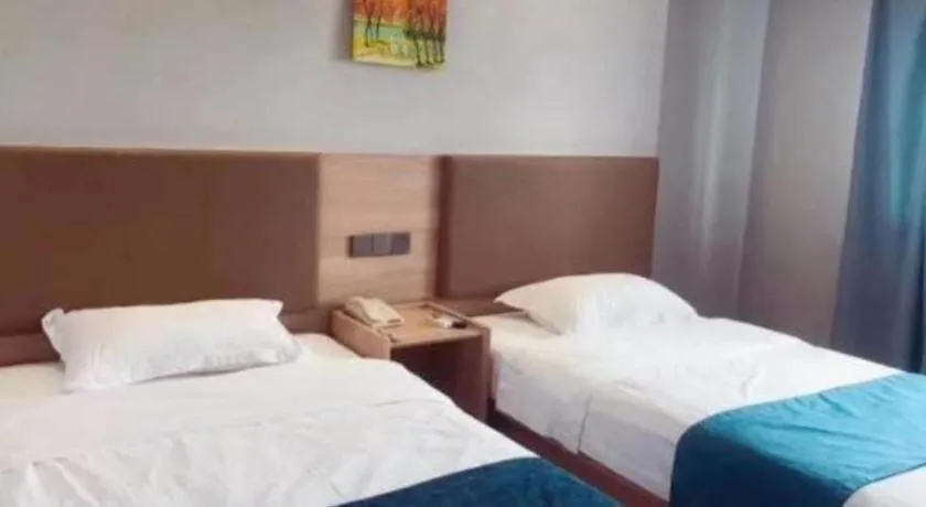 Bed in GreenTree Inn Jiaxing Tongxiang Tudian Express Hotel