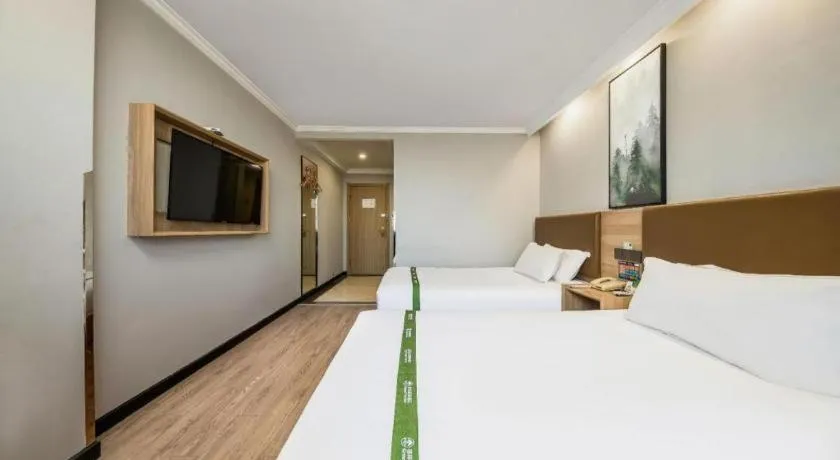 Bed in GreenTree Inn Jiaxing Tongxiang Tudian Express Hotel