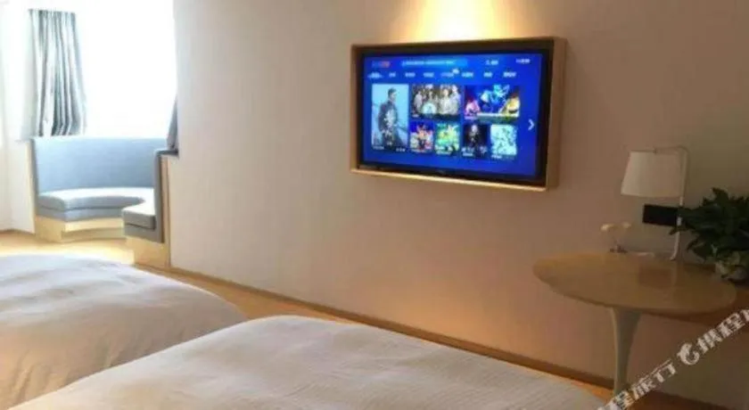 Bed in GreenTree Inn Lianyungang Suning Square Hualian Mantion Hotel