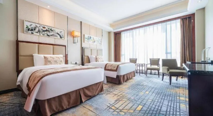 Bed in Eurasia Convention International Hotel