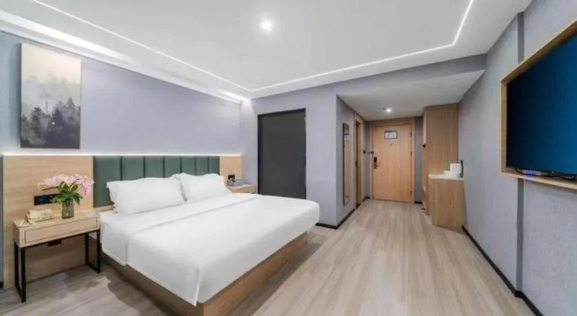 Bed in GreenTree Inn Taizhou Gaogang District Business Hotel