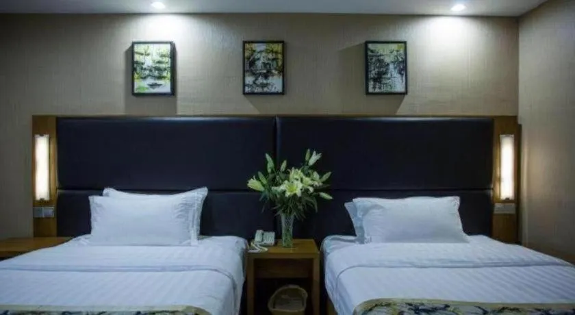 Bed in GreenTree Inn Taizhou Gaogang District Business Hotel