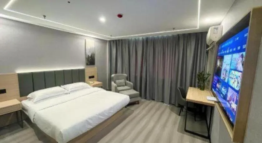 Bed in GreenTree Inn Taizhou Gaogang District Business Hotel