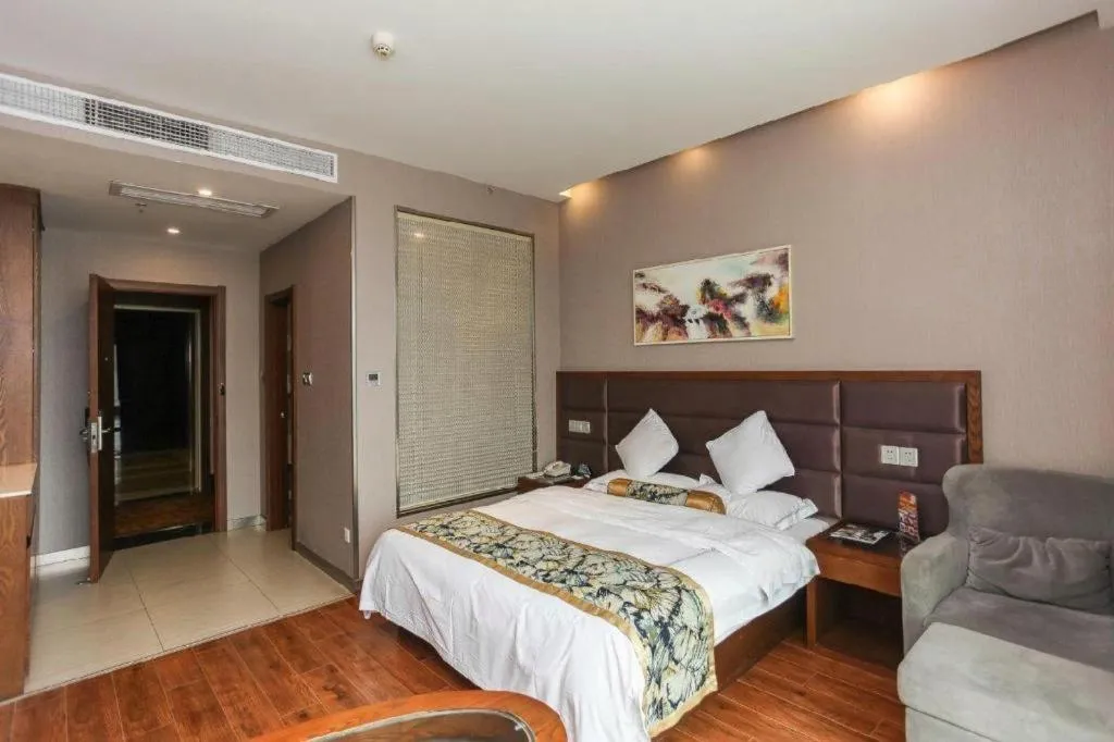 Bed in GreenTree Inn Taizhou Gaogang District Business Hotel