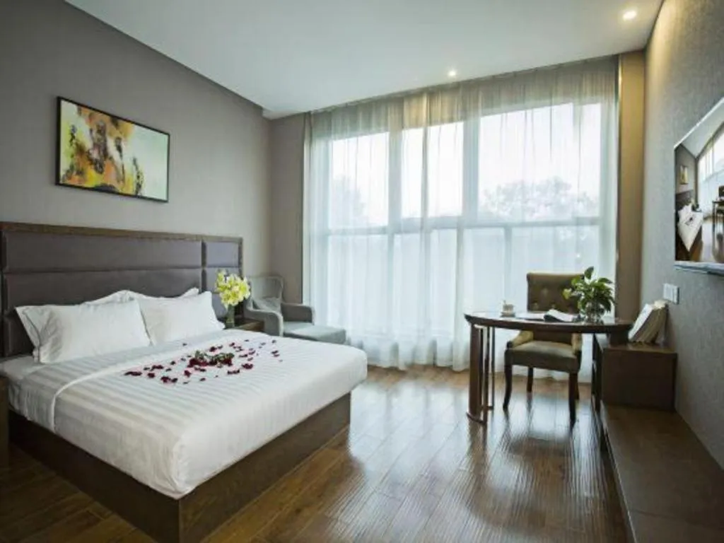 Bed in GreenTree Inn Taizhou Gaogang District Business Hotel
