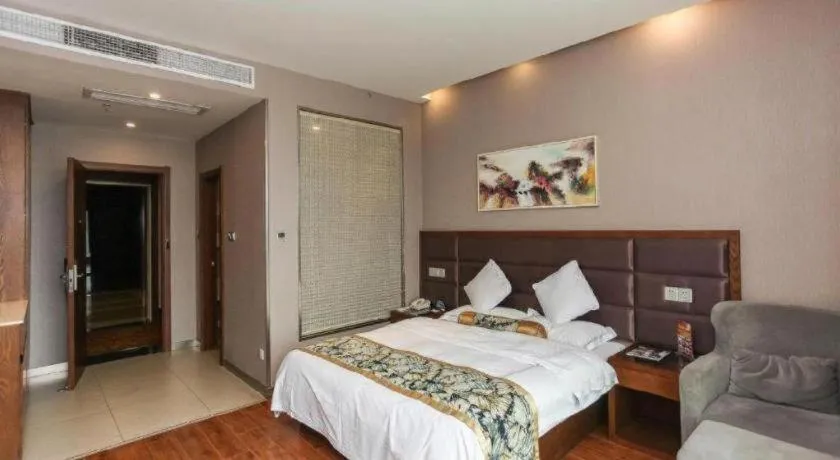 Bed in GreenTree Inn Taizhou Gaogang District Business Hotel