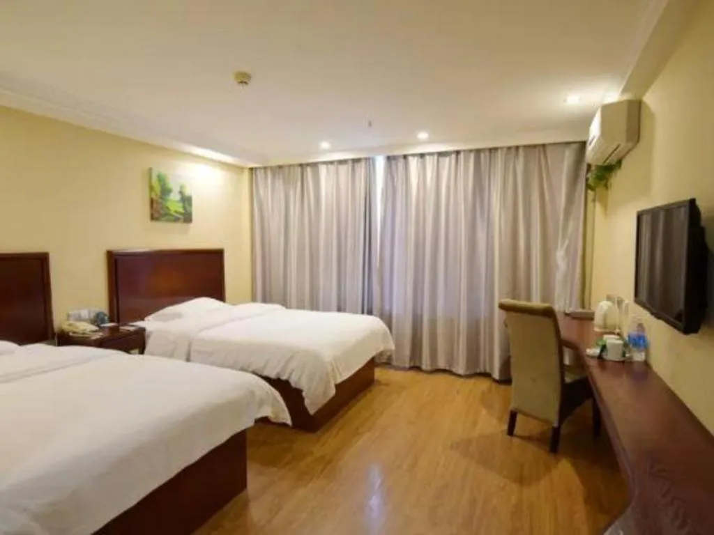Bed in GreenTree Inn Taizhou Gaogang District Business Hotel