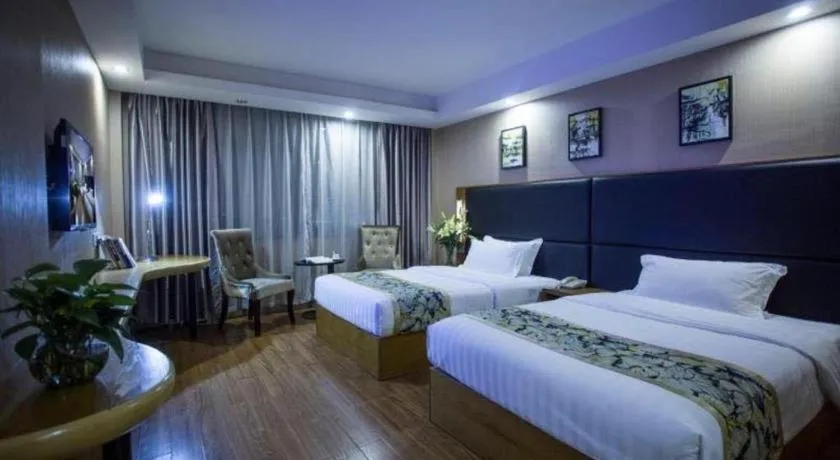 Bed in GreenTree Inn Taizhou Gaogang District Business Hotel