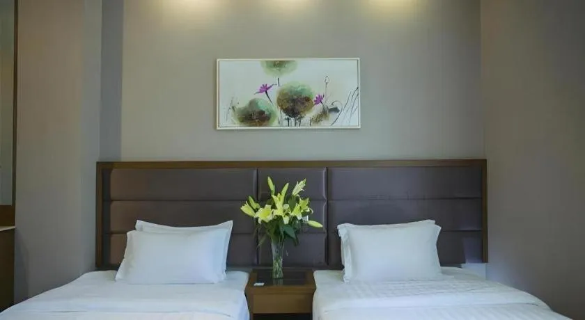 Bed in GreenTree Inn Taizhou Gaogang District Business Hotel
