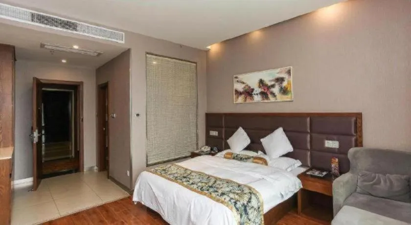 Bed in GreenTree Inn Taizhou Gaogang District Business Hotel