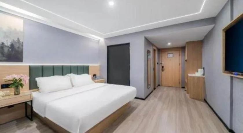 Bed in GreenTree Inn Taizhou Gaogang District Business Hotel