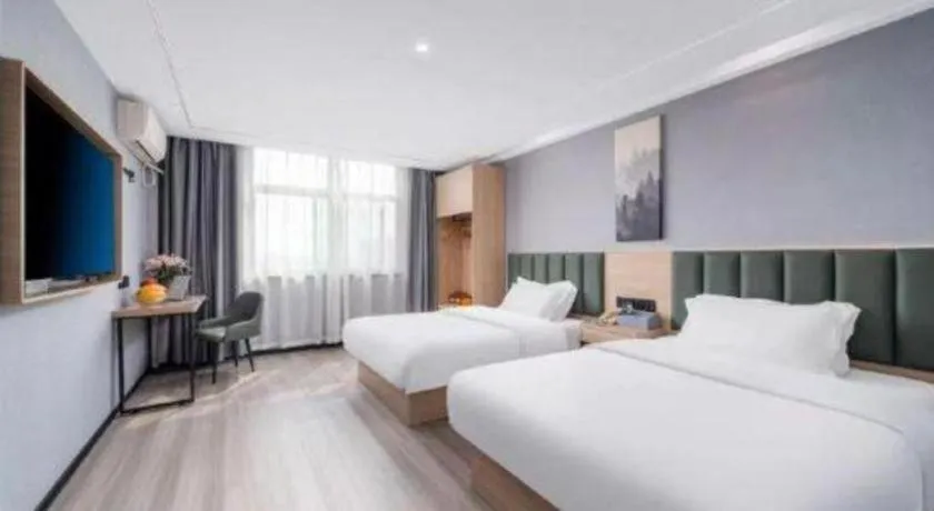 Bed in GreenTree Inn Taizhou Gaogang District Business Hotel