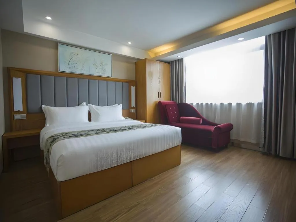 Bed in GreenTree Inn Taizhou Gaogang District Business Hotel